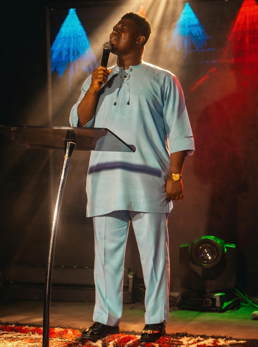 Prophet Moses Akor in worship at altar